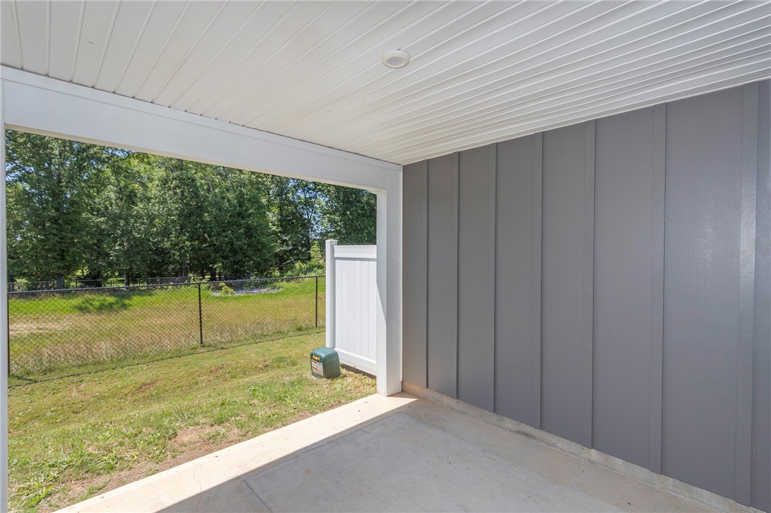 233 Scenic Road Anderson, SC 29621 - Photo 48 of 50 A private covered patio provides a serene outdoor retreat.