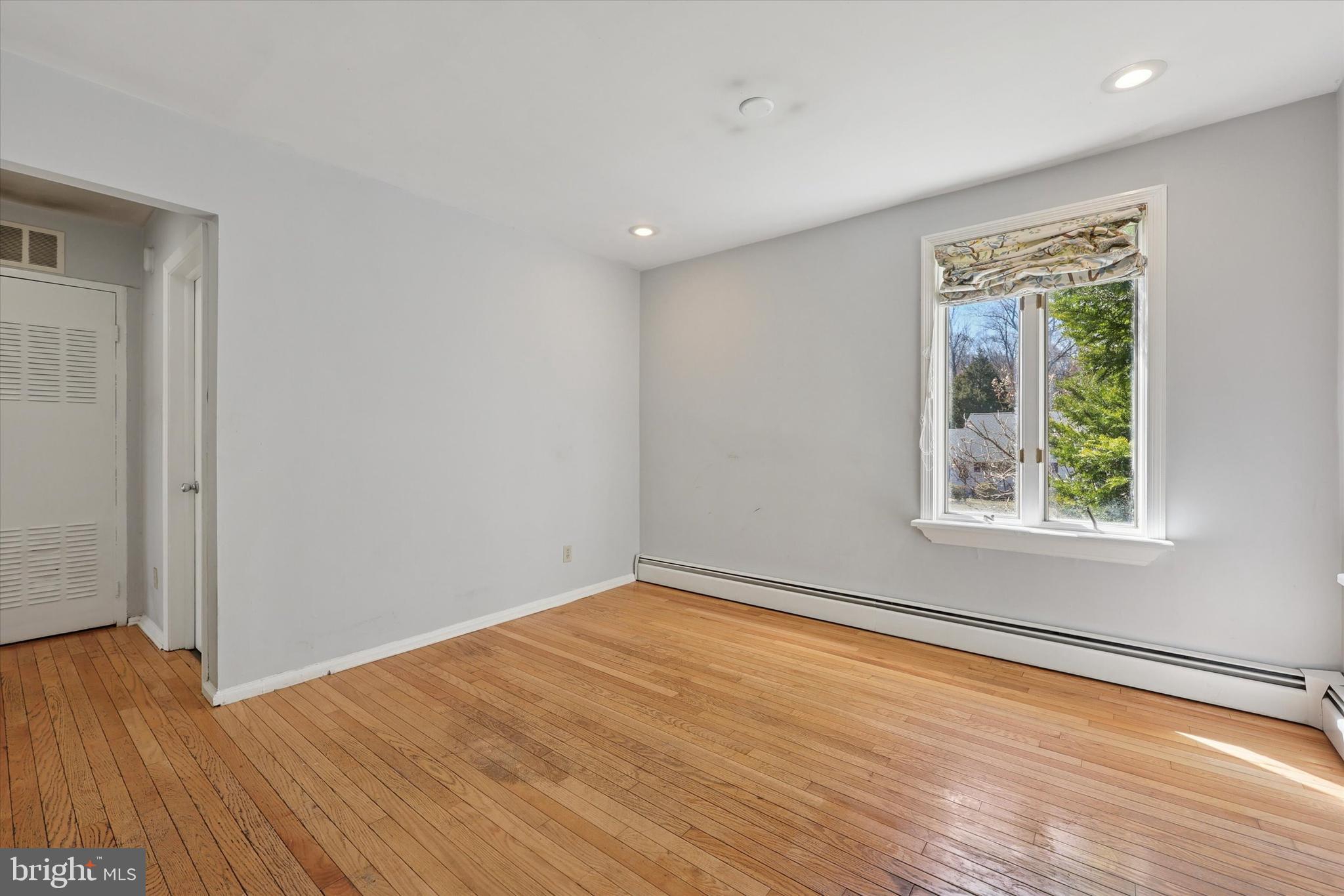 13 Devonwood Road Wayne, PA 19087 - Photo 13 of 24 a view of empty room with wooden floor and fan