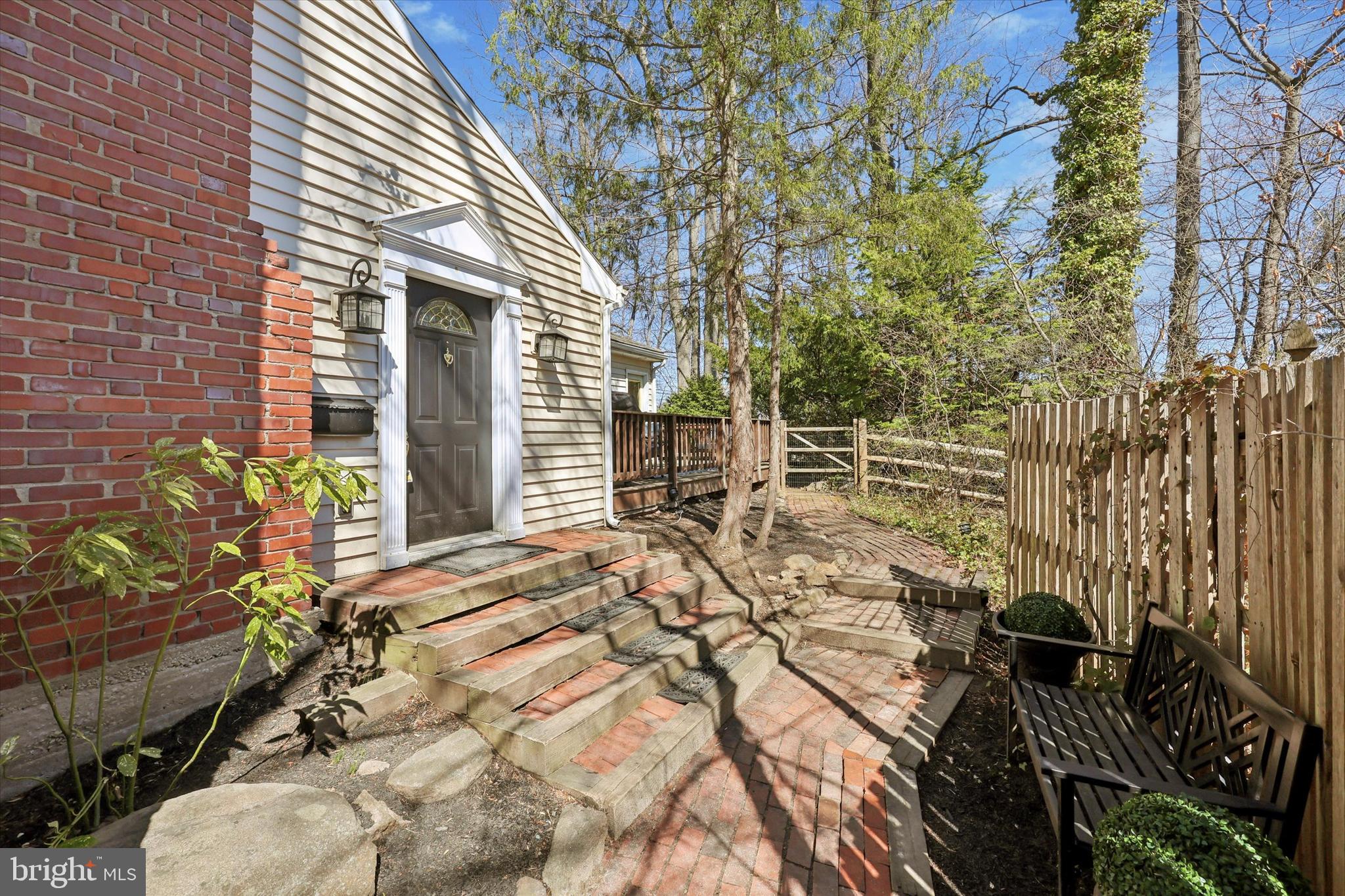 13 Devonwood Road Wayne, PA 19087 - Photo 2 of 24 a view of a backyard with sitting area