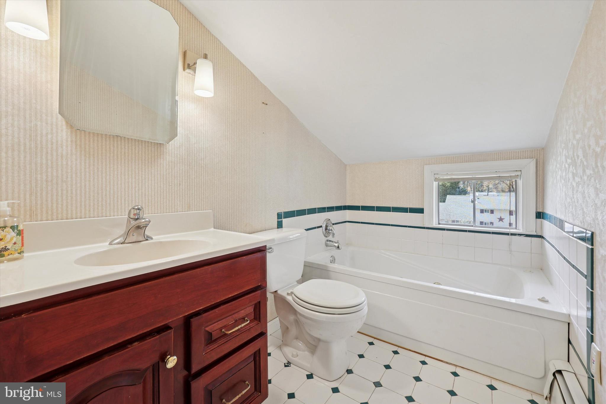 13 Devonwood Road Wayne, PA 19087 - Photo 21 of 24 a bathroom with a sink toilet vanity and bathtub