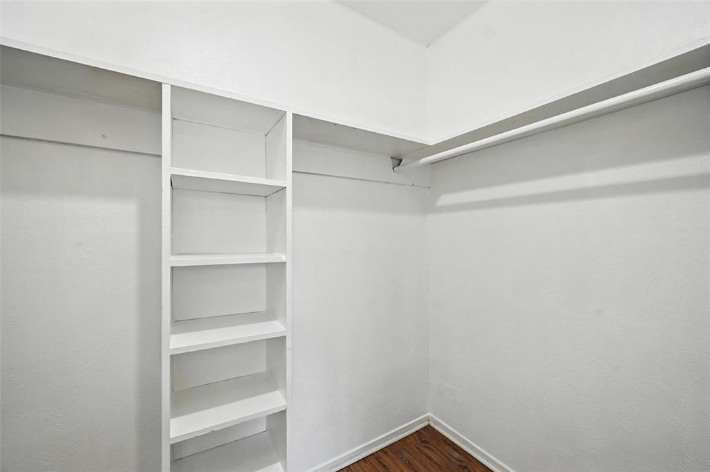 103 West Brown Street, Unit 5 Wylie, TX 75098 - Photo 17 of 24 a view of an empty walk in closet