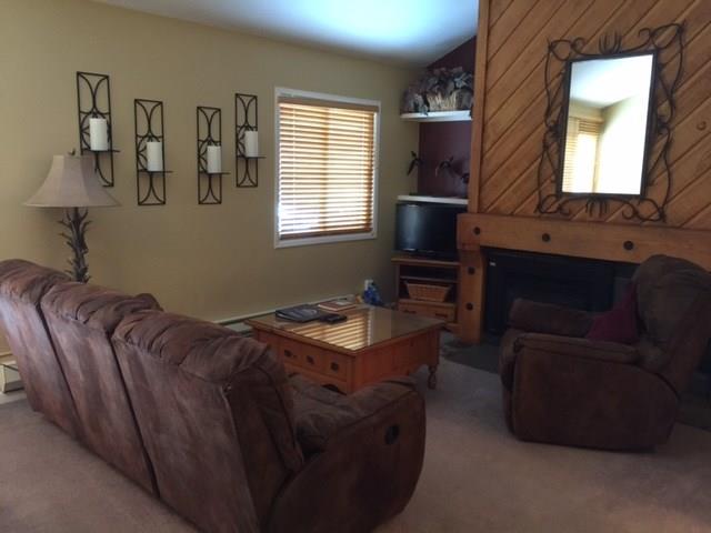 1977 Soda Ridge Road, Unit 1171 Keystone, CO 80435 - Photo 17 of 21 a living room with furniture and a window