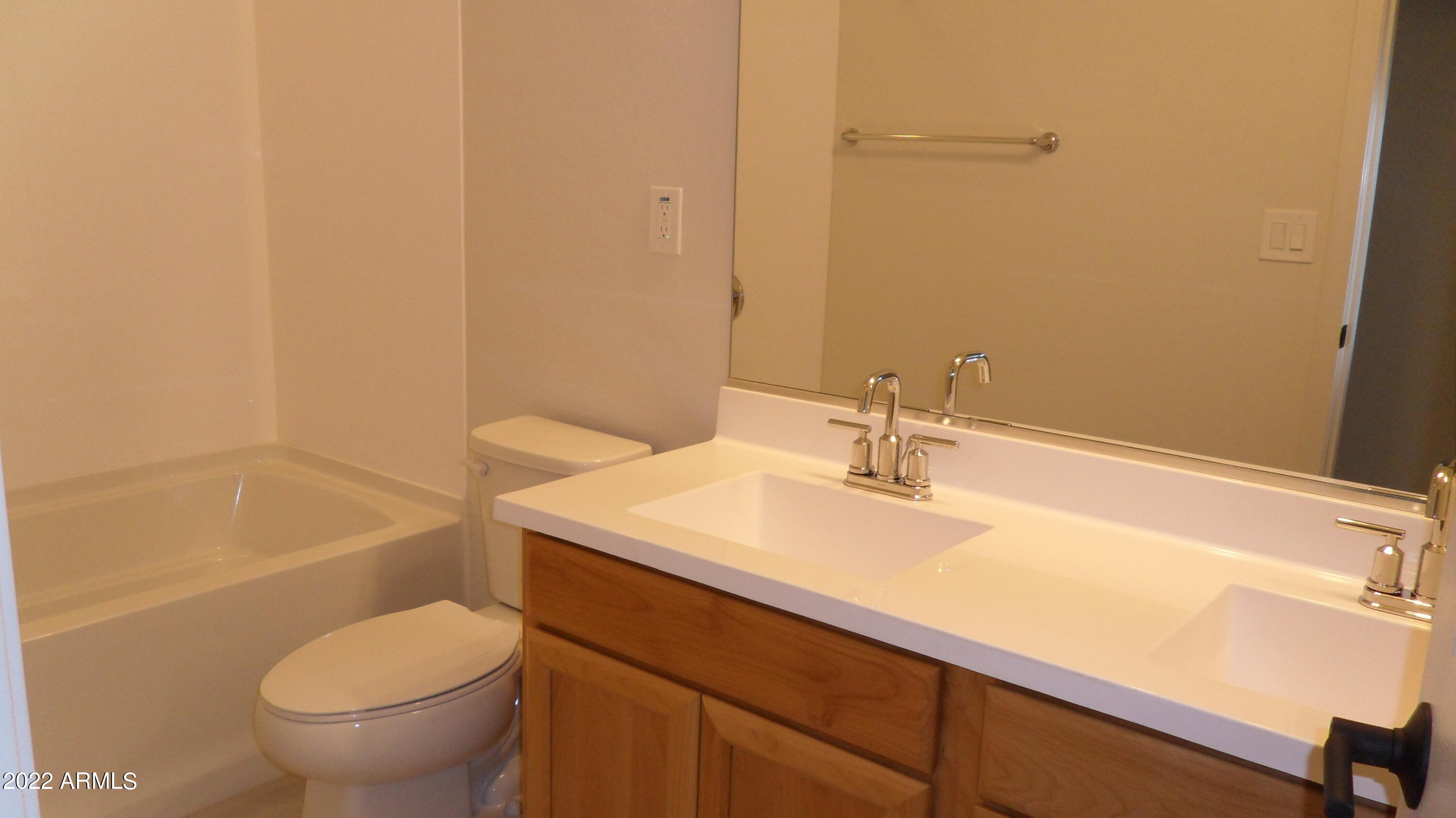 5613 North 87th Drive Glendale, AZ 85305 - Photo 10 of 16 hall bath w/ double sinks