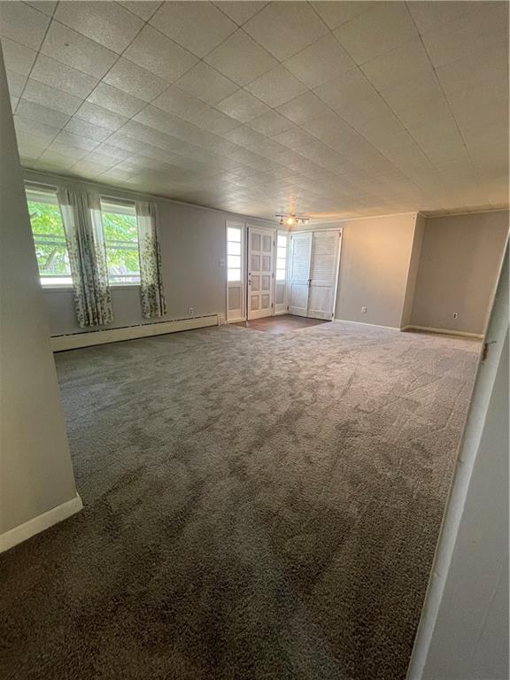 450 Jackson Street Rochester, PA 15074 - Photo 3 of 24 en empty room with windows
