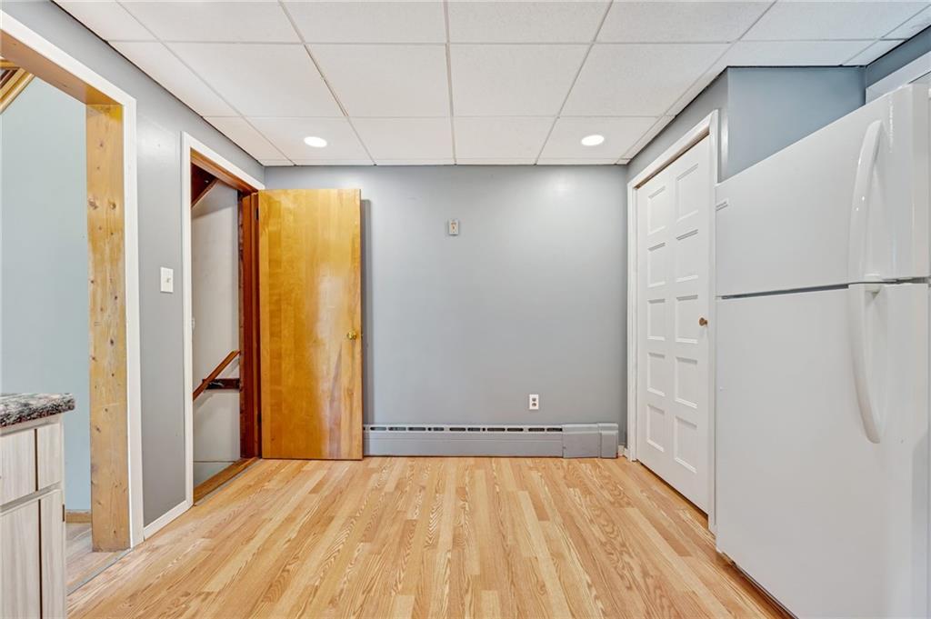 450 Jackson Street Rochester, PA 15074 - Photo 8 of 24 a view of an empty room with a window