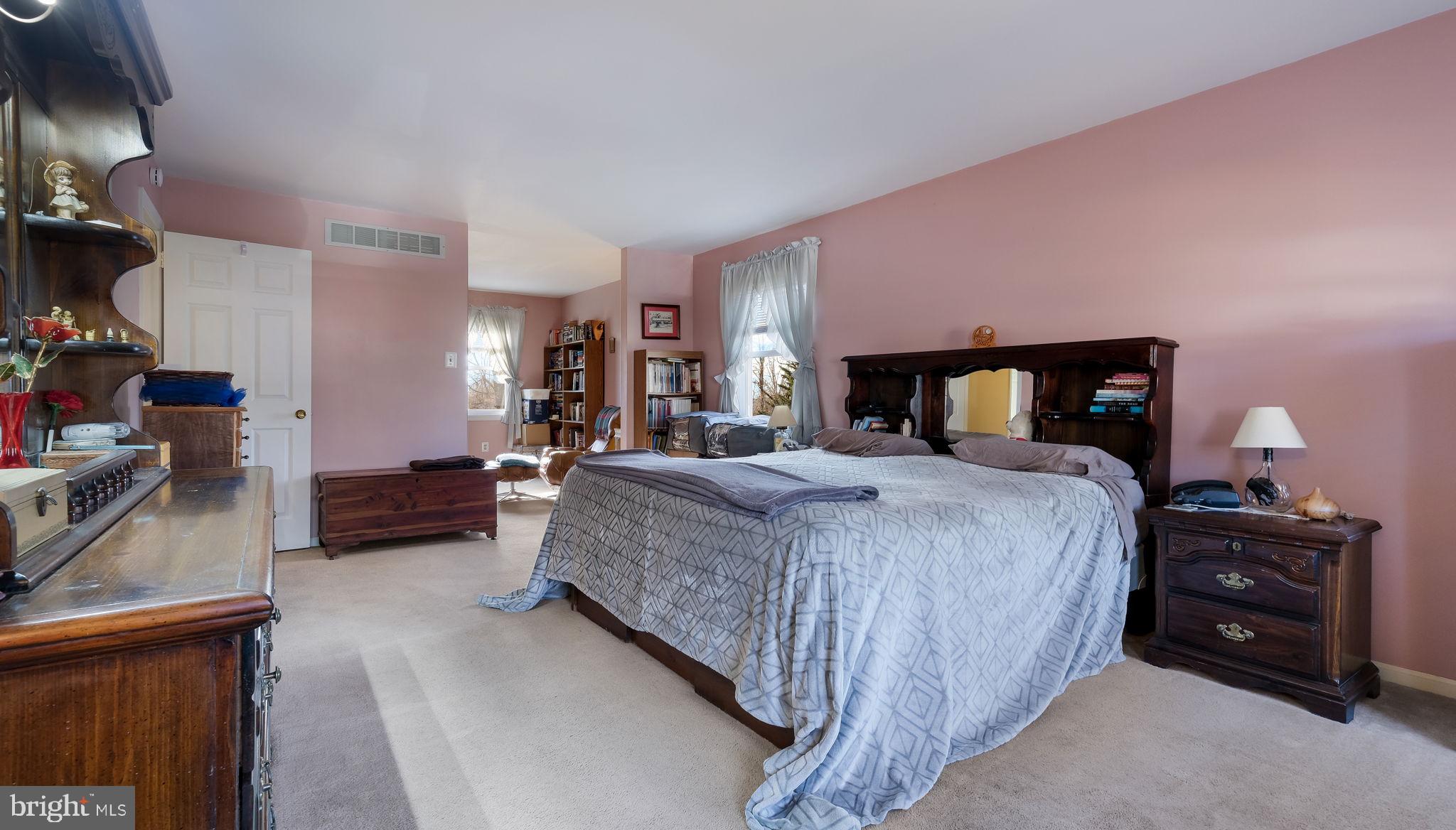 1267 Holly Road Warrington, PA 18976 - Photo 24 of 42 a bed room with a bed and a television