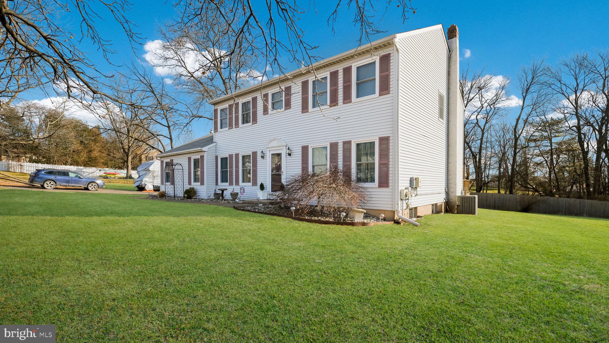 1267 Holly Road Warrington, PA 18976 - Photo 4 of 42 a view of a house with a yard and sitting area