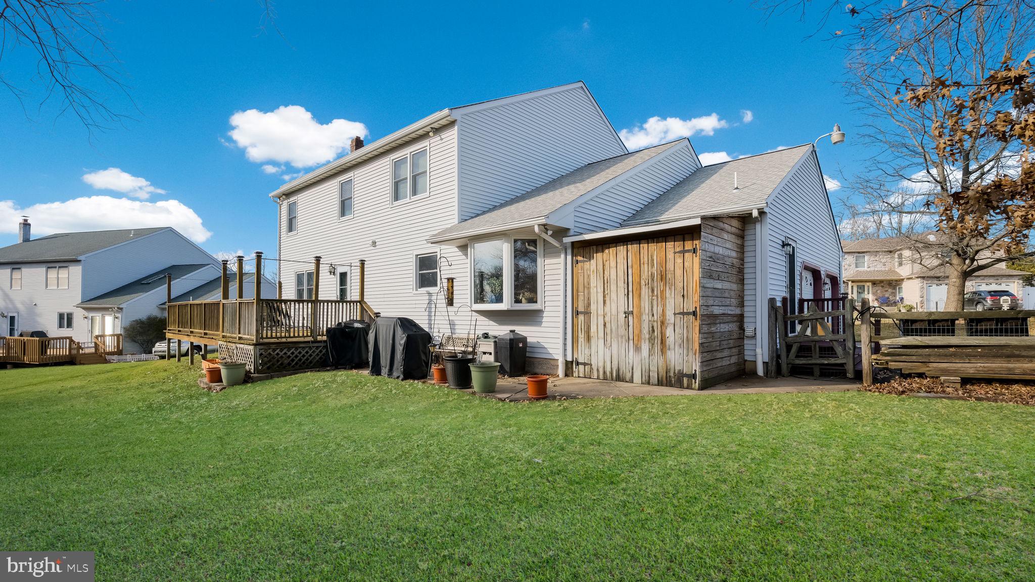 1267 Holly Road Warrington, PA 18976 - Photo 42 of 42 a front view of a house with a yard