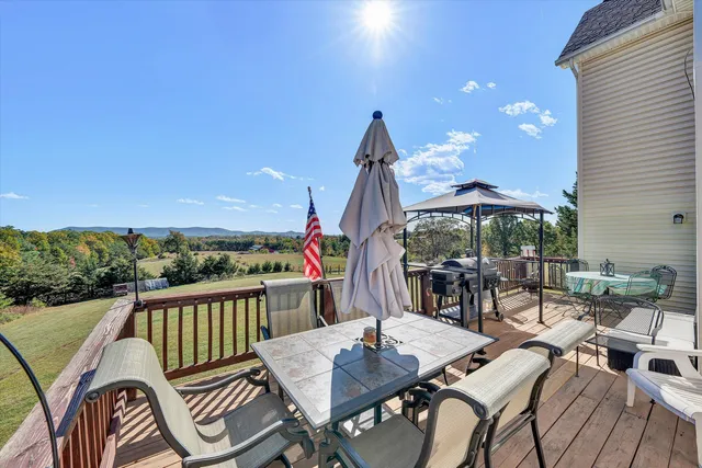 a view of balcony with furniture and rug