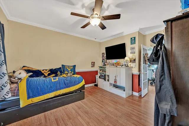 a bathroom with a sink a toilet and a shower curtain