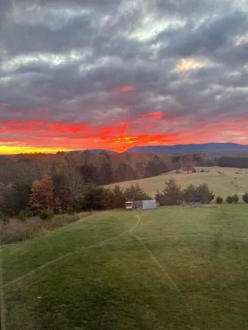 a view of lake with mountain
