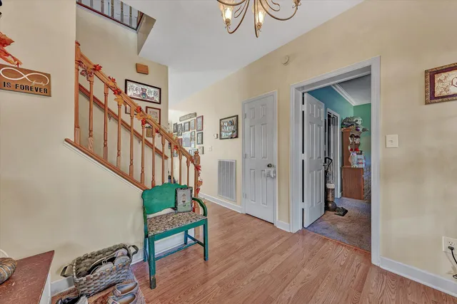 a view of entryway with wooden floor