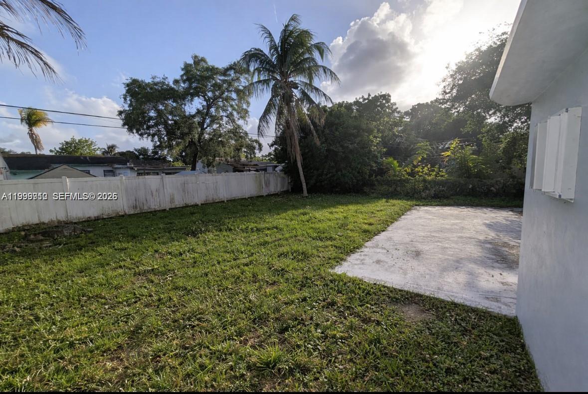 442 Northeast 162nd Street Miami, FL 33162 - Photo 9 of 9 a view of a backyard