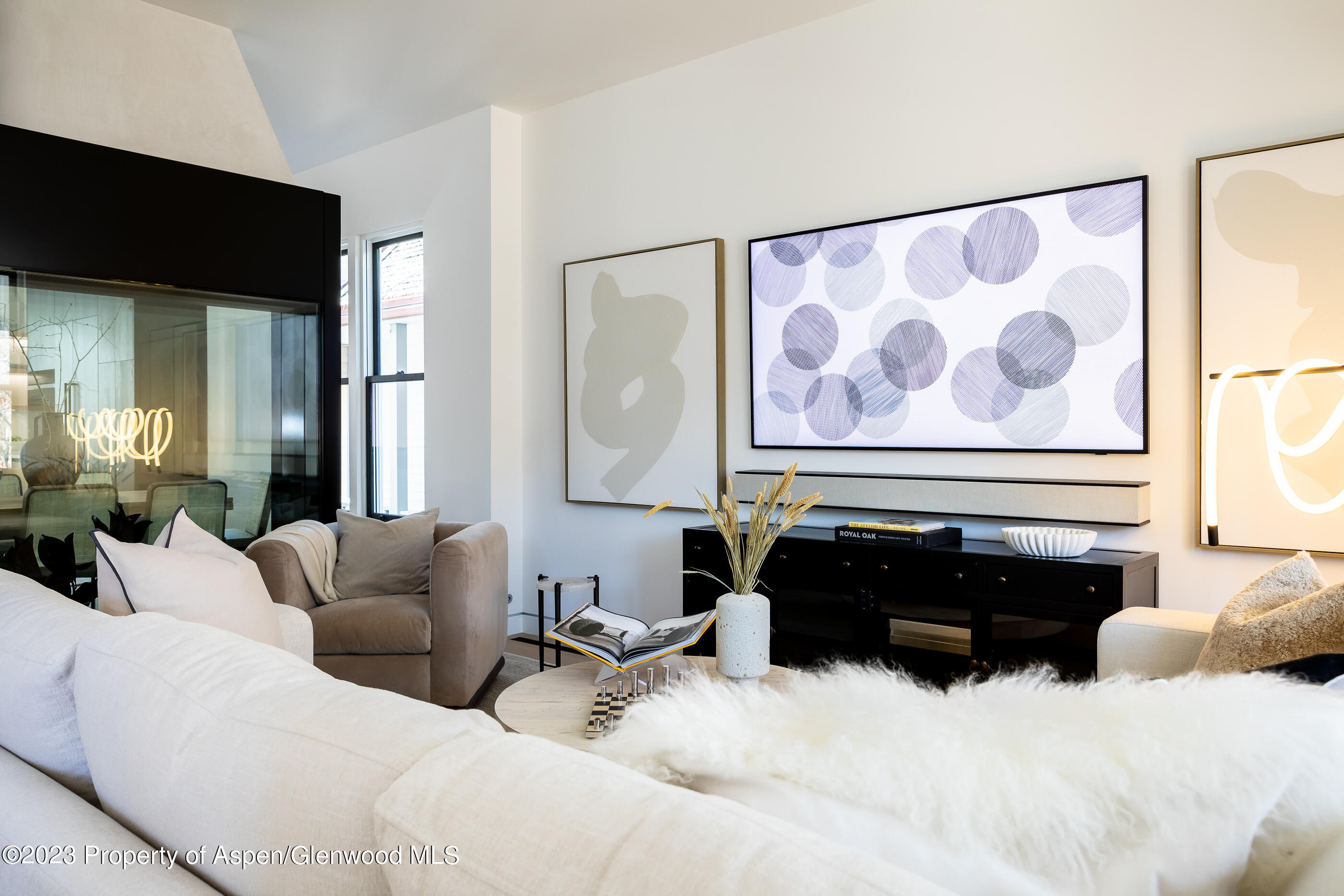 125 West Main Street Aspen, CO 81611 - Photo 1 of 52 a living room with furniture