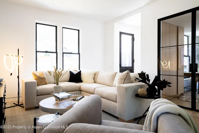 a living room with furniture or window and a couch