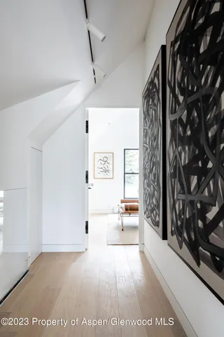 a view of entryway with wooden floor