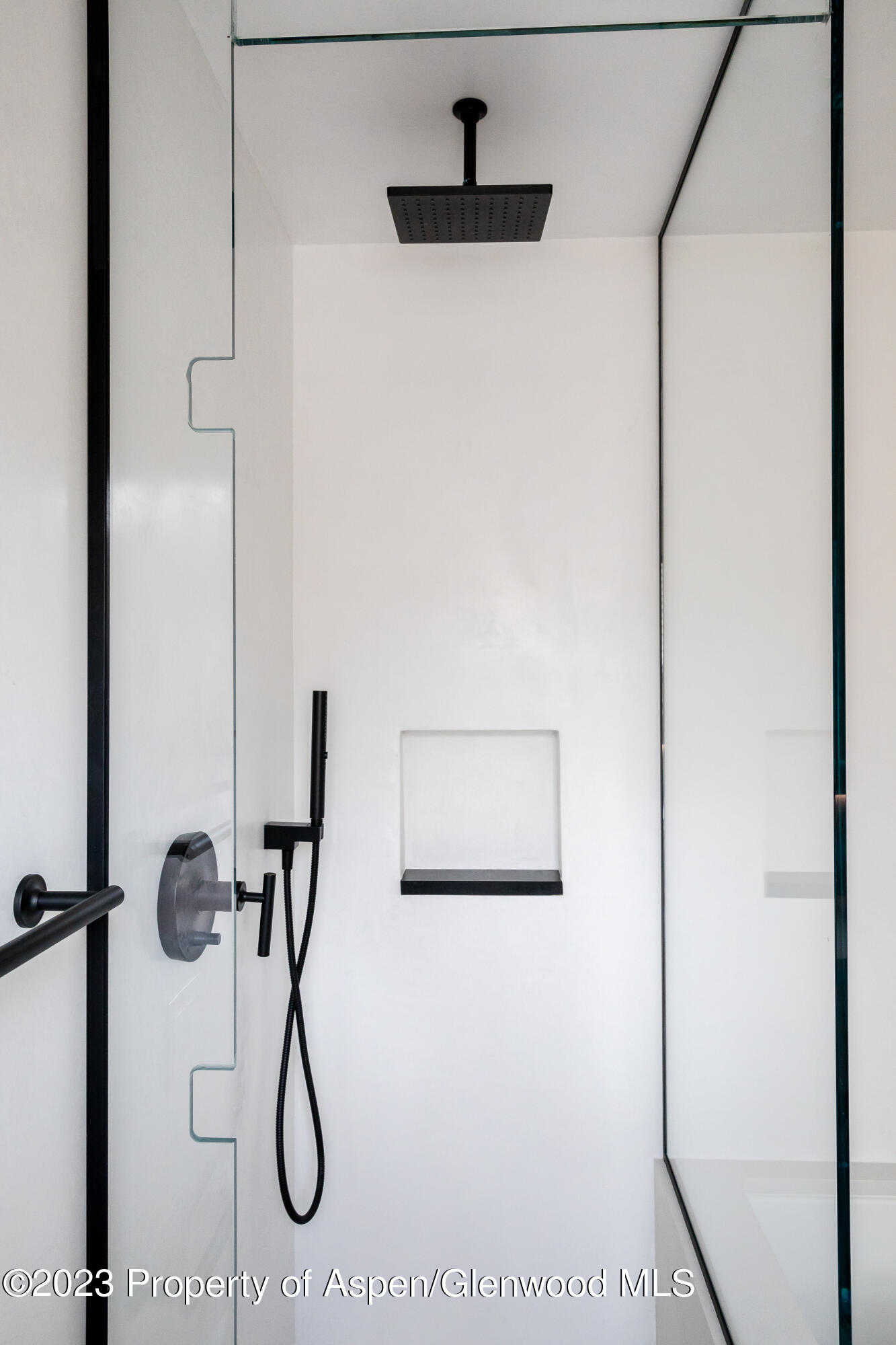 125 West Main Street Aspen, CO 81611 - Photo 31 of 52 a picture of a bathroom with a shower