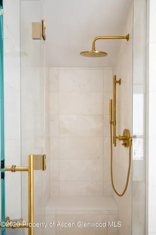 a kitchen with furniture and window