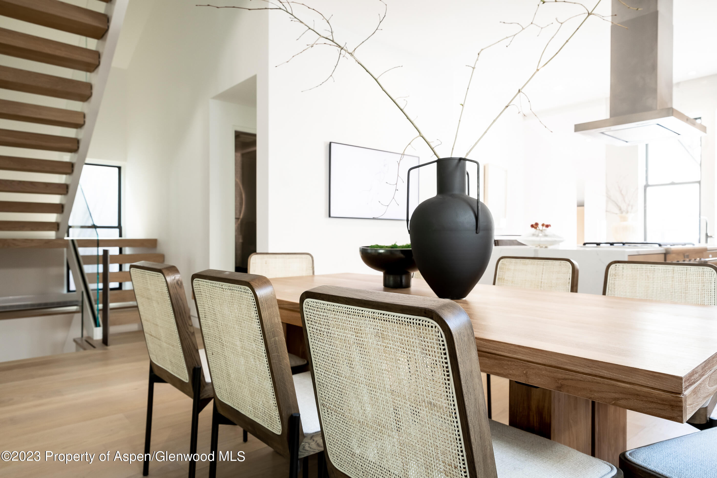125 West Main Street Aspen, CO 81611 - Photo 36 of 52 a kitchen with furniture and window