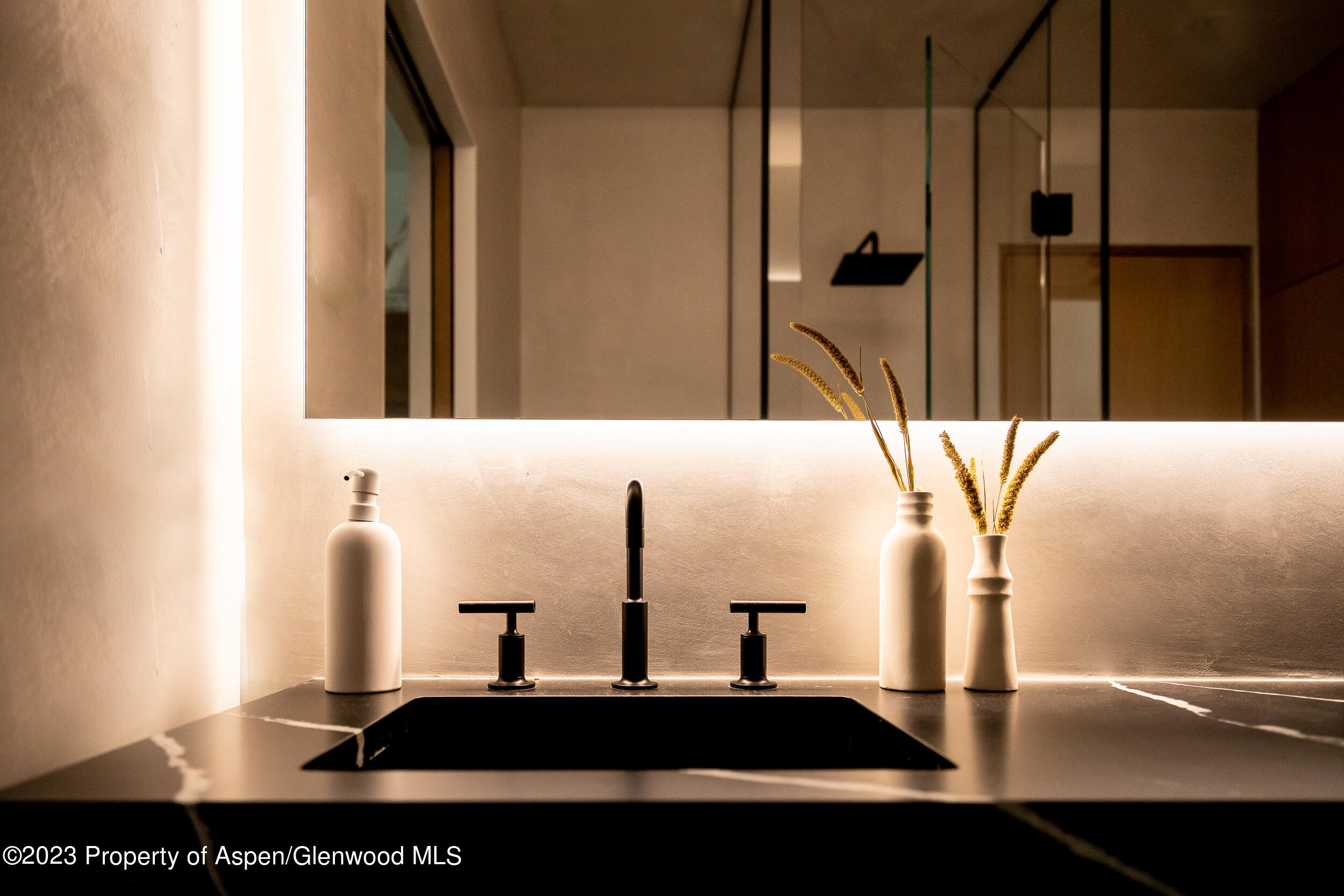 125 West Main Street Aspen, CO 81611 - Photo 45 of 52 a view of a bathroom with a sink