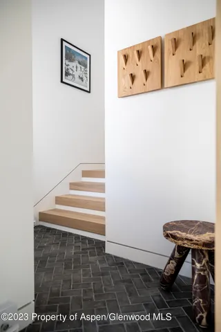 a room that has a rug and a chair