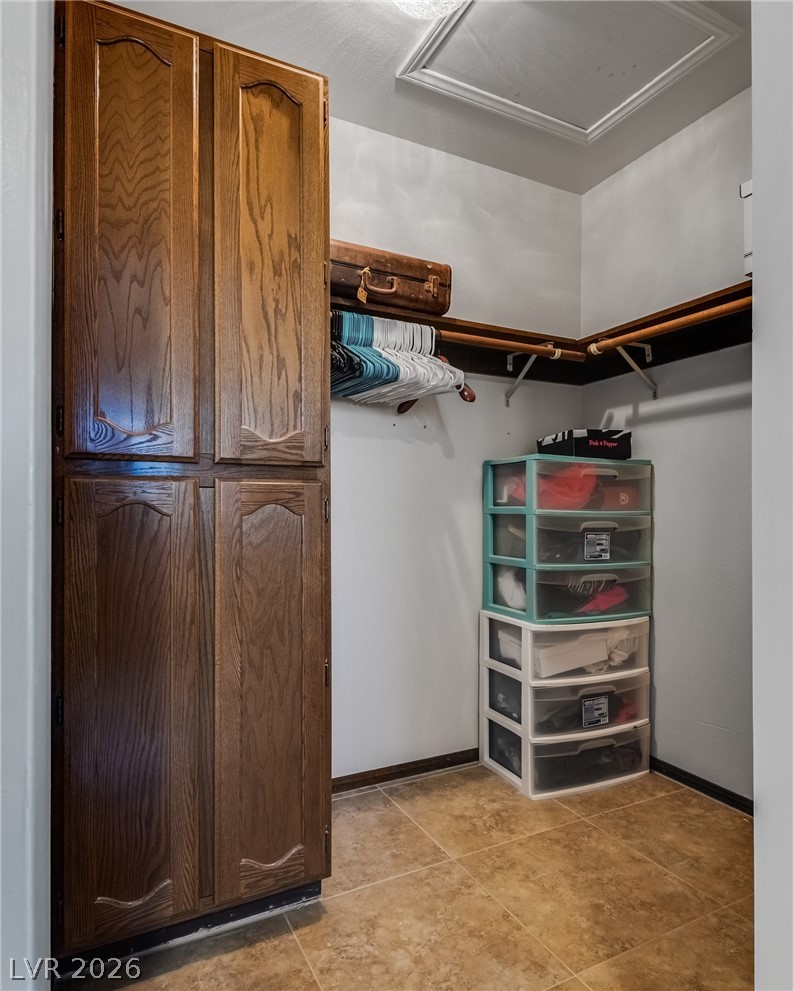 524 Swallow Cove Boulder City, NV 89005 - Photo 35 of 58 Ample built-in storage and convenient shelving elevate this practical closet space.