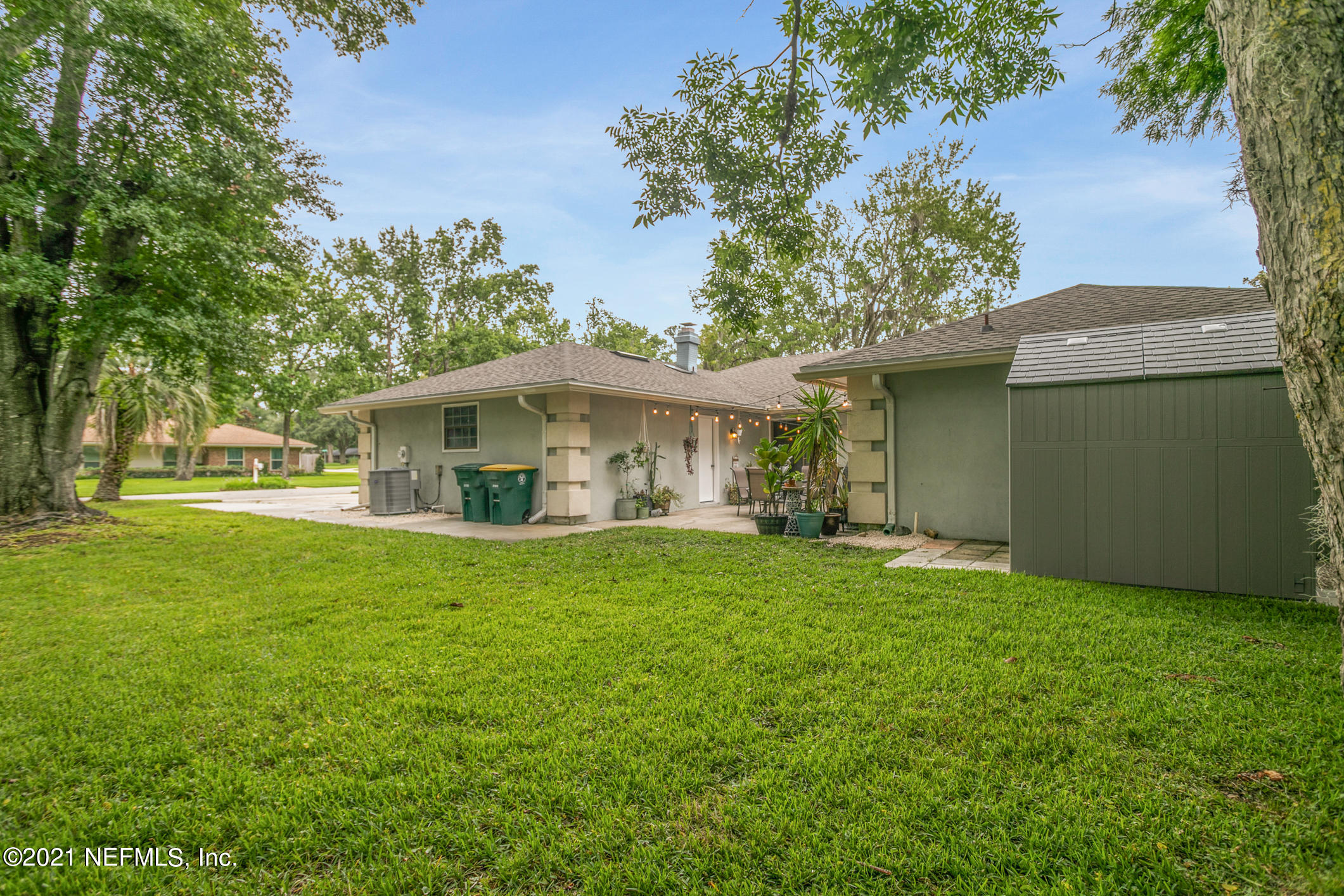 11705 Edinburgh Way Jacksonville, FL 32223 - Photo 20 of 33 a front view of a house with a garden