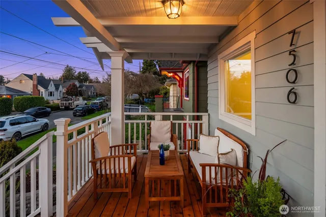 a view of a balcony with chairs