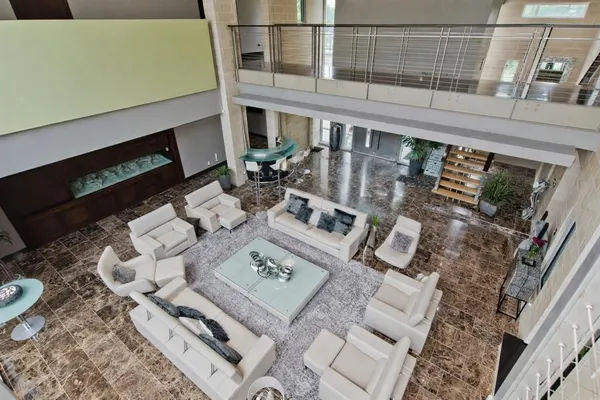 a view of table and chairs in patio