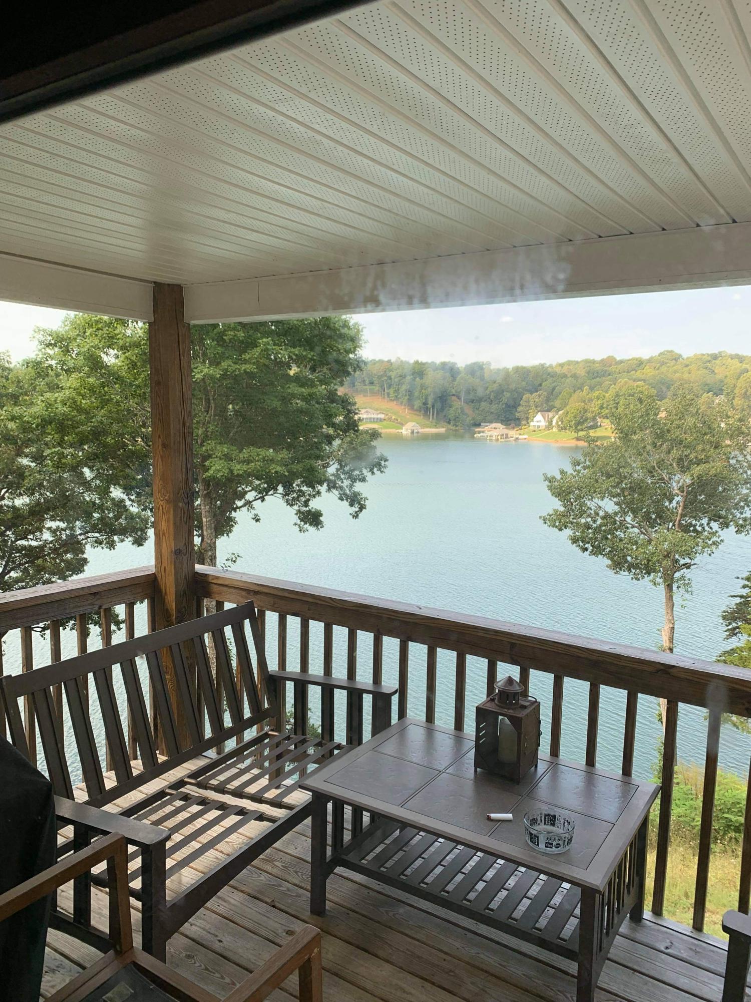 6331 Horseshoe Bend Road Goodview, VA 24095 - Photo 11 of 75 a view of a balcony with wooden floor