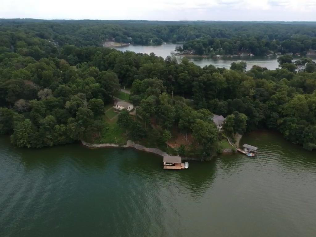 6331 Horseshoe Bend Road Goodview, VA 24095 - Photo 12 of 75 a view of a lake with trees all around