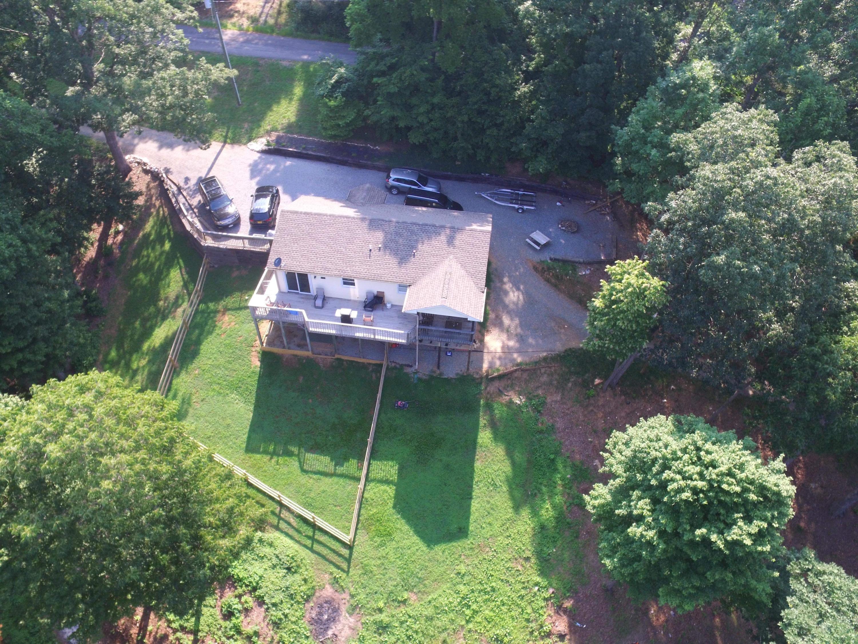 6331 Horseshoe Bend Road Goodview, VA 24095 - Photo 3 of 75 an aerial view of a house with a yard