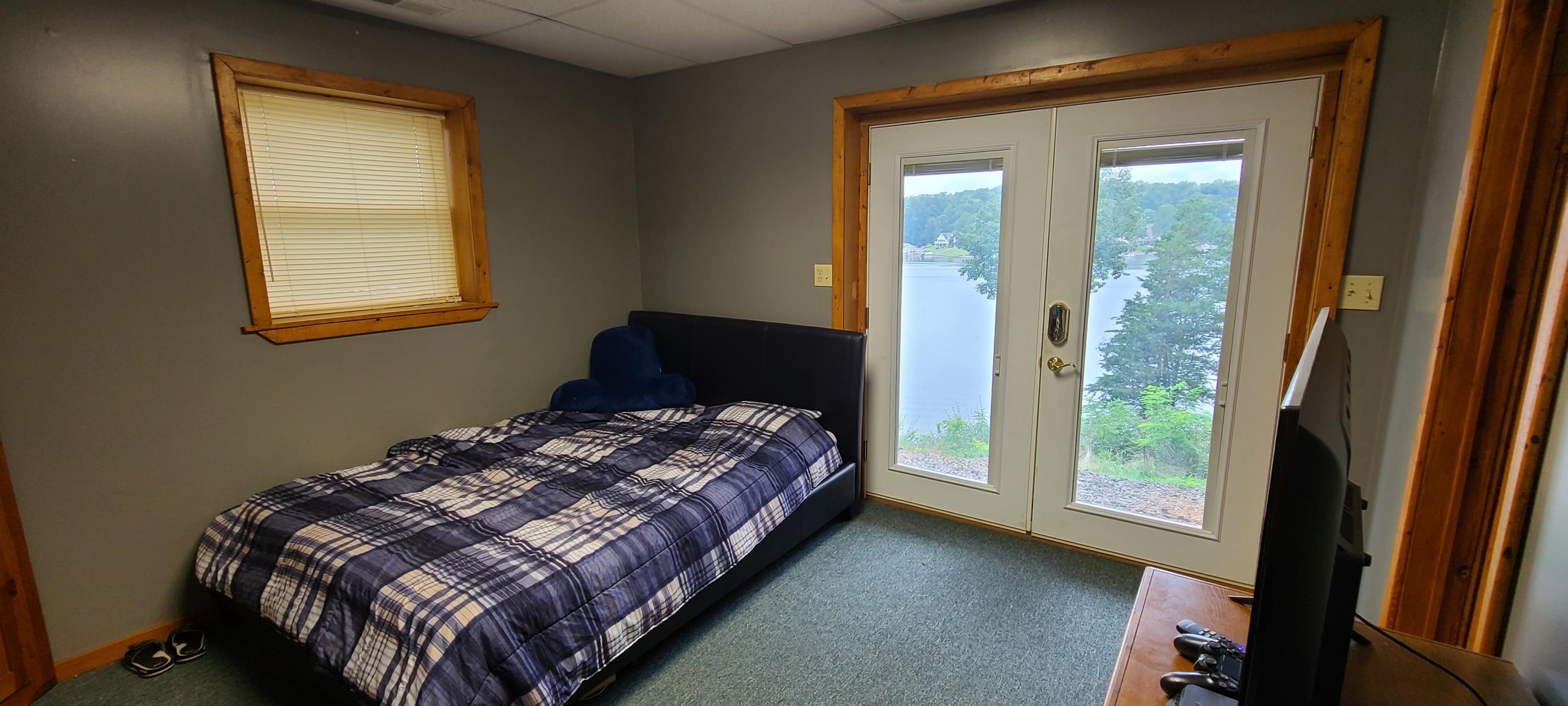 6331 Horseshoe Bend Road Goodview, VA 24095 - Photo 34 of 75 a bedroom with a bed and a window