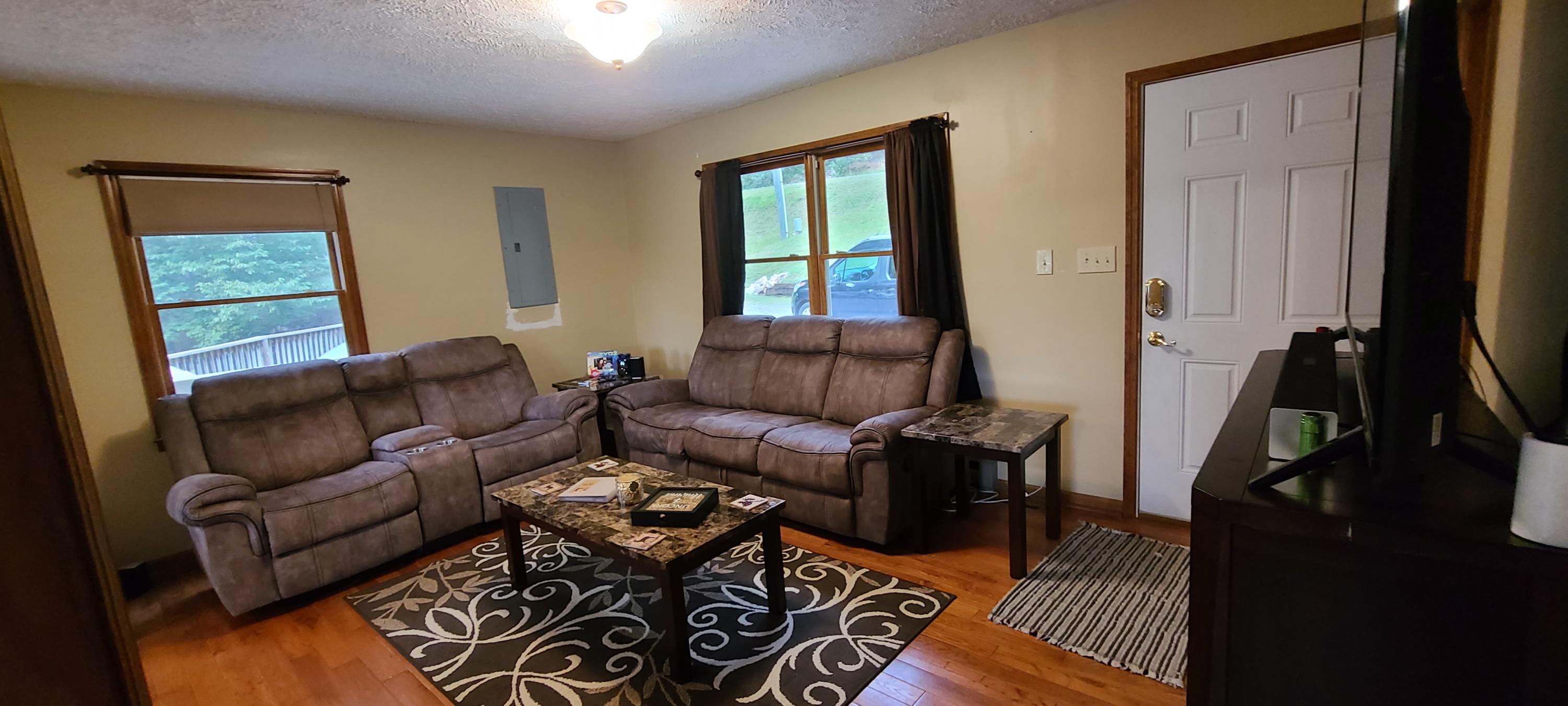 6331 Horseshoe Bend Road Goodview, VA 24095 - Photo 53 of 75 a living room with furniture and a window