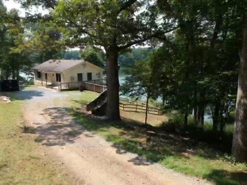6331 Horseshoe Bend Road Goodview, VA 24095 - Photo 60 of 75 a view of a house with a yard