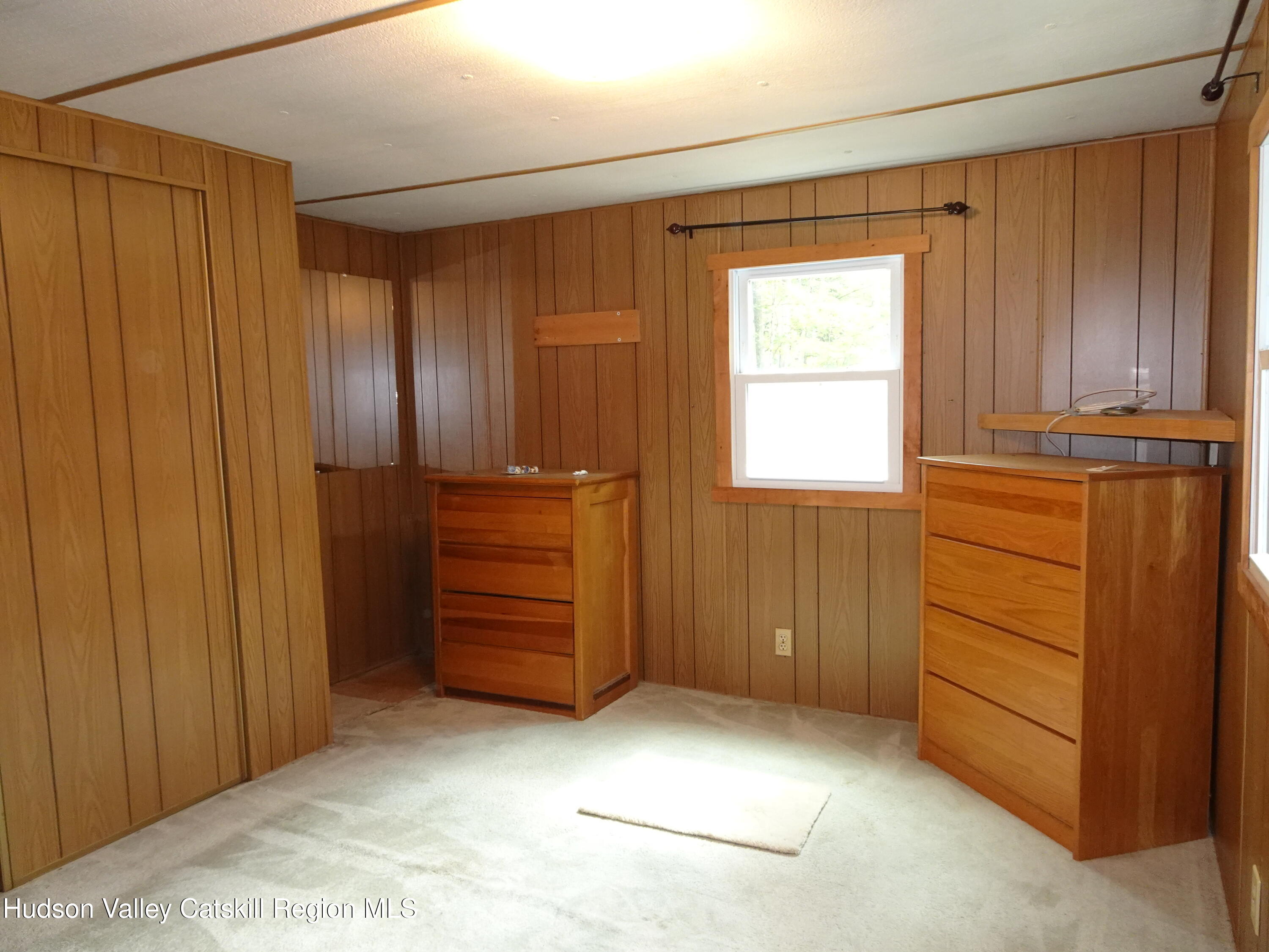 158 Middle Road Austerlitz, NY 12017 - Photo 15 of 21 an empty room with cabinet and closet