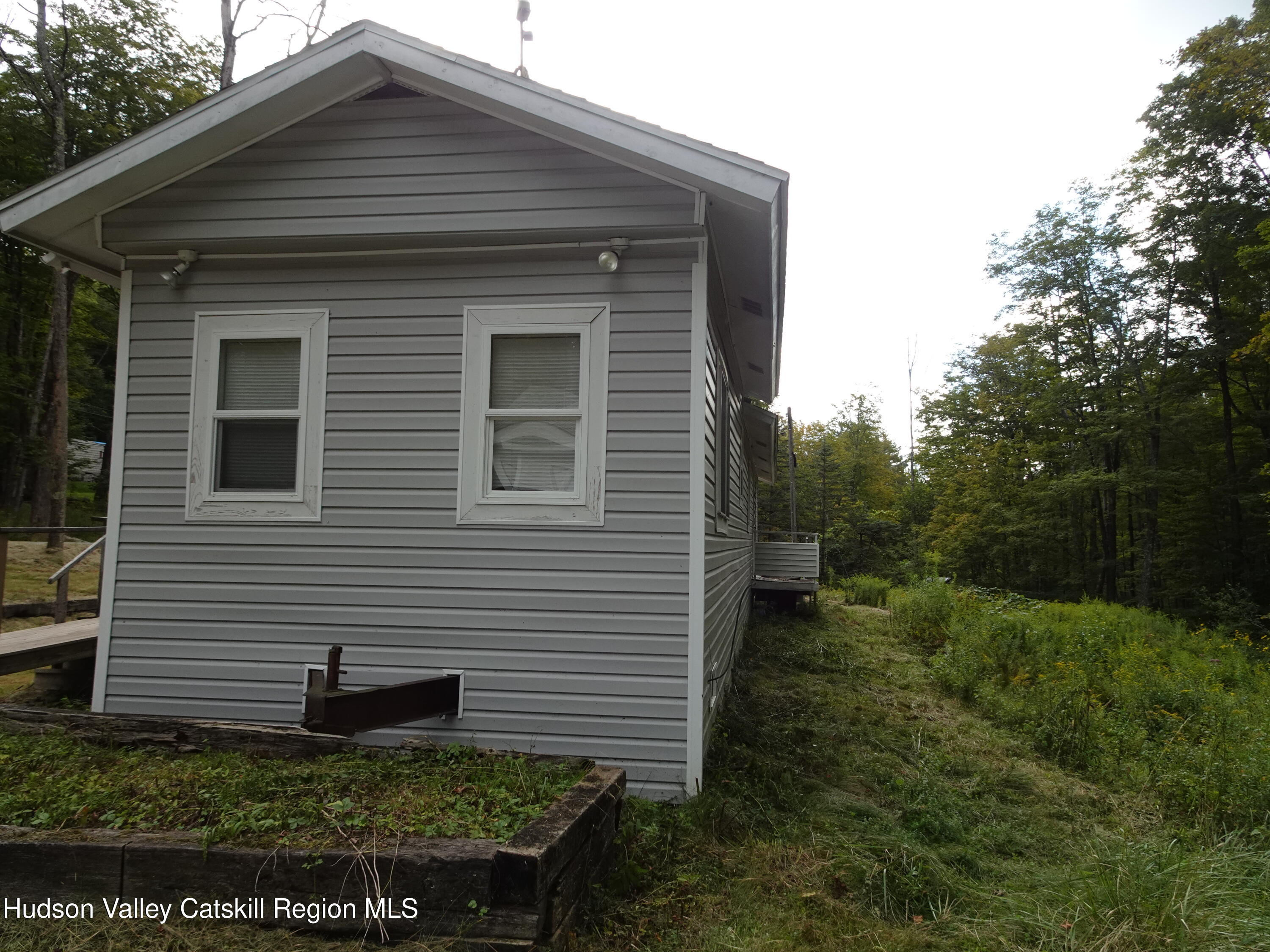 158 Middle Road Austerlitz, NY 12017 - Photo 17 of 21 a front view of a house with a yard