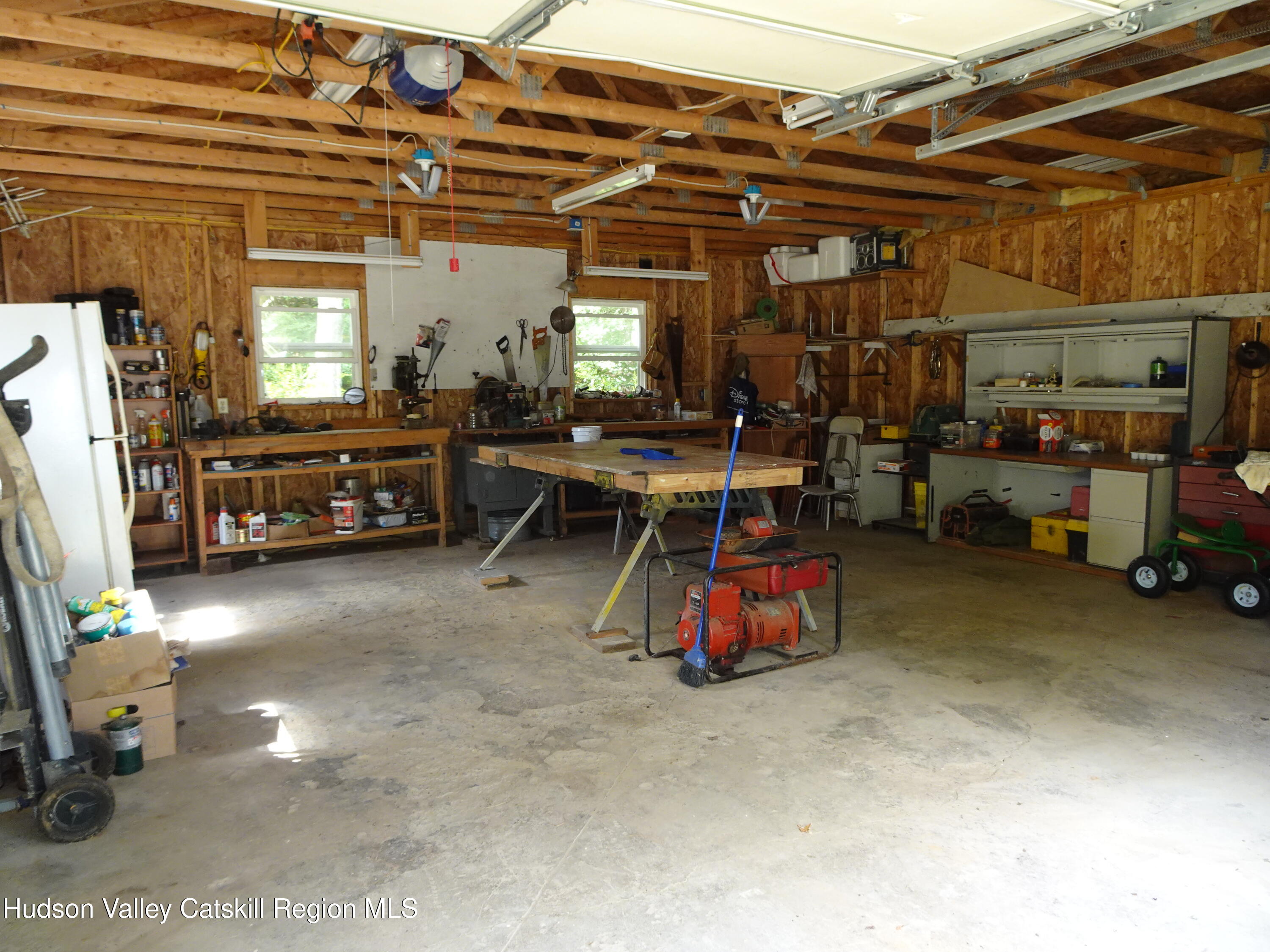158 Middle Road Austerlitz, NY 12017 - Photo 20 of 21 a view of a room with lots of furniture and a chandelier