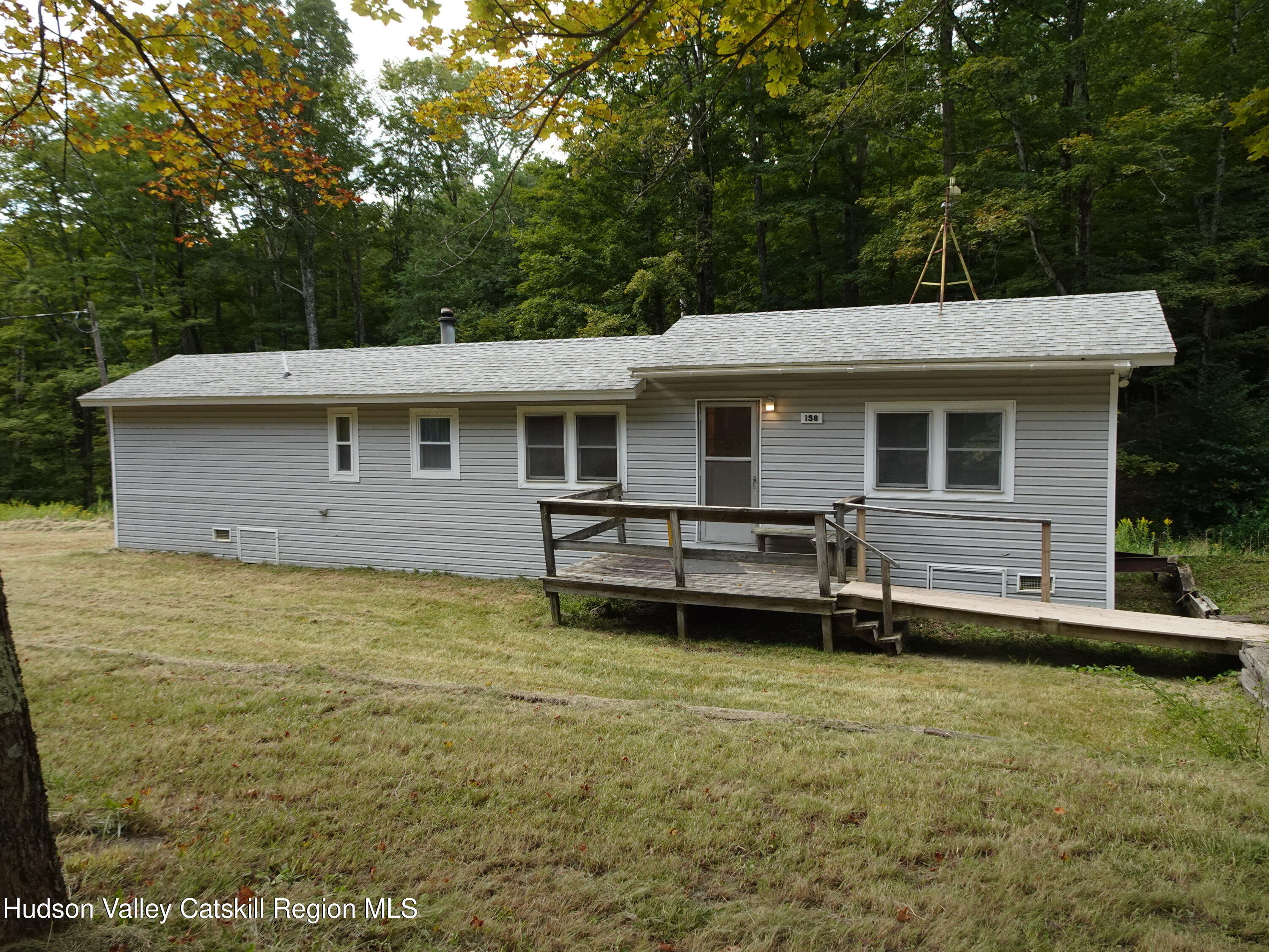 158 Middle Road Austerlitz, NY 12017 - Photo 2 of 21 a house view with a garden space