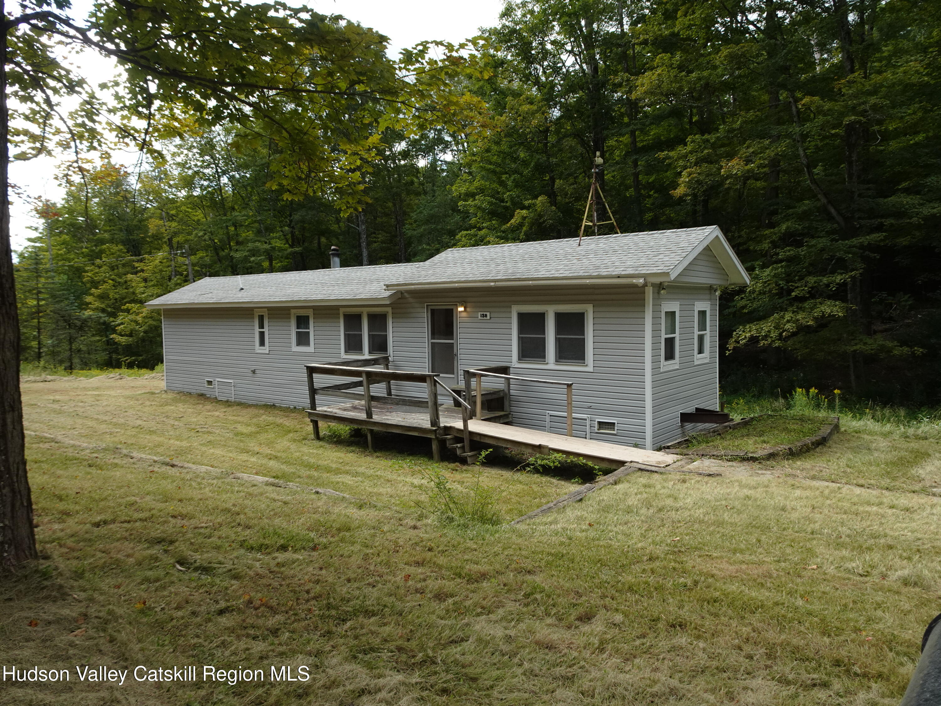158 Middle Road Austerlitz, NY 12017 - Photo 5 of 21 a view of a house with pool and chairs