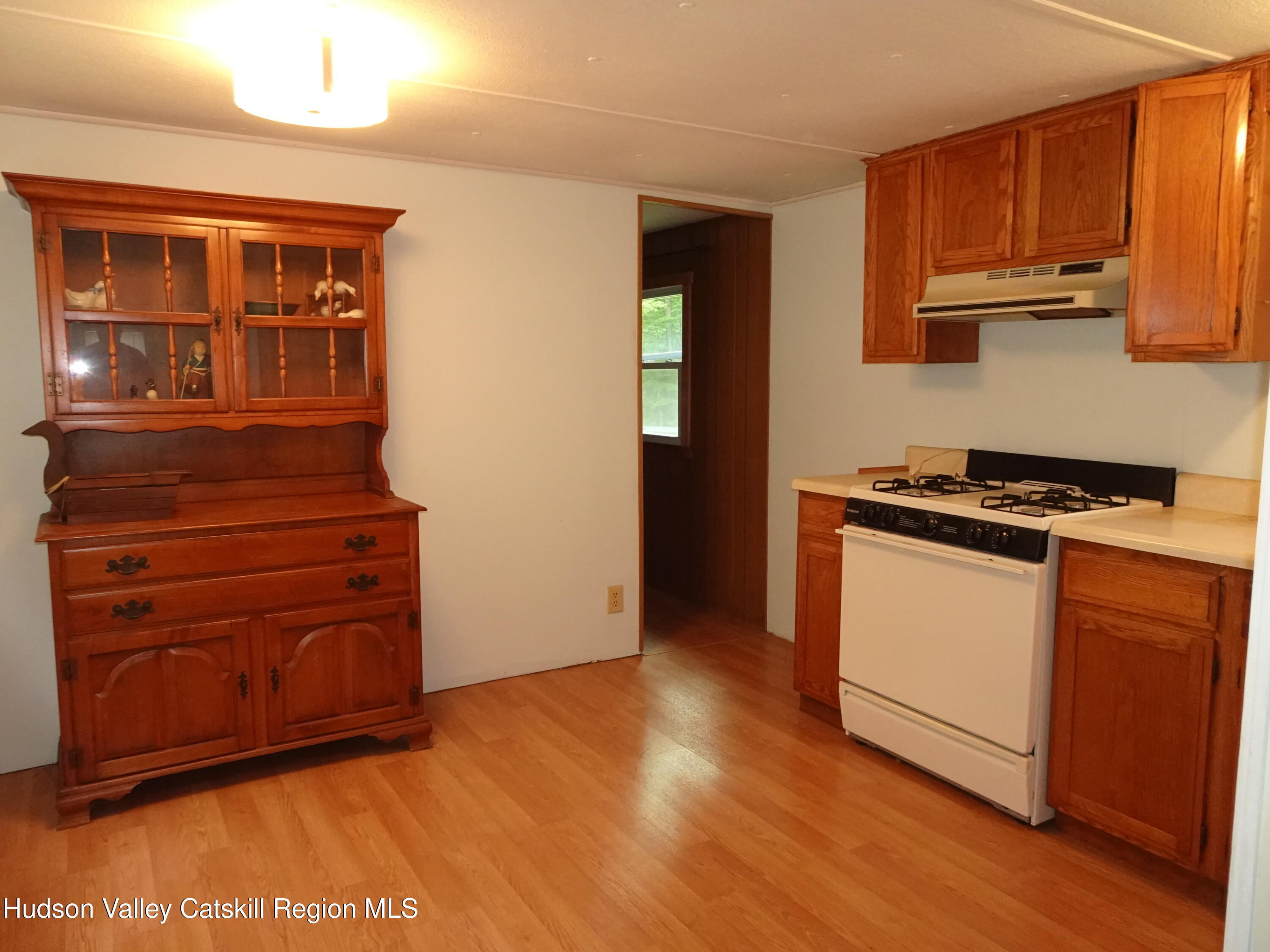 158 Middle Road Austerlitz, NY 12017 - Photo 9 of 21 a kitchen with stainless steel appliances granite countertop a stove and a refrigerator