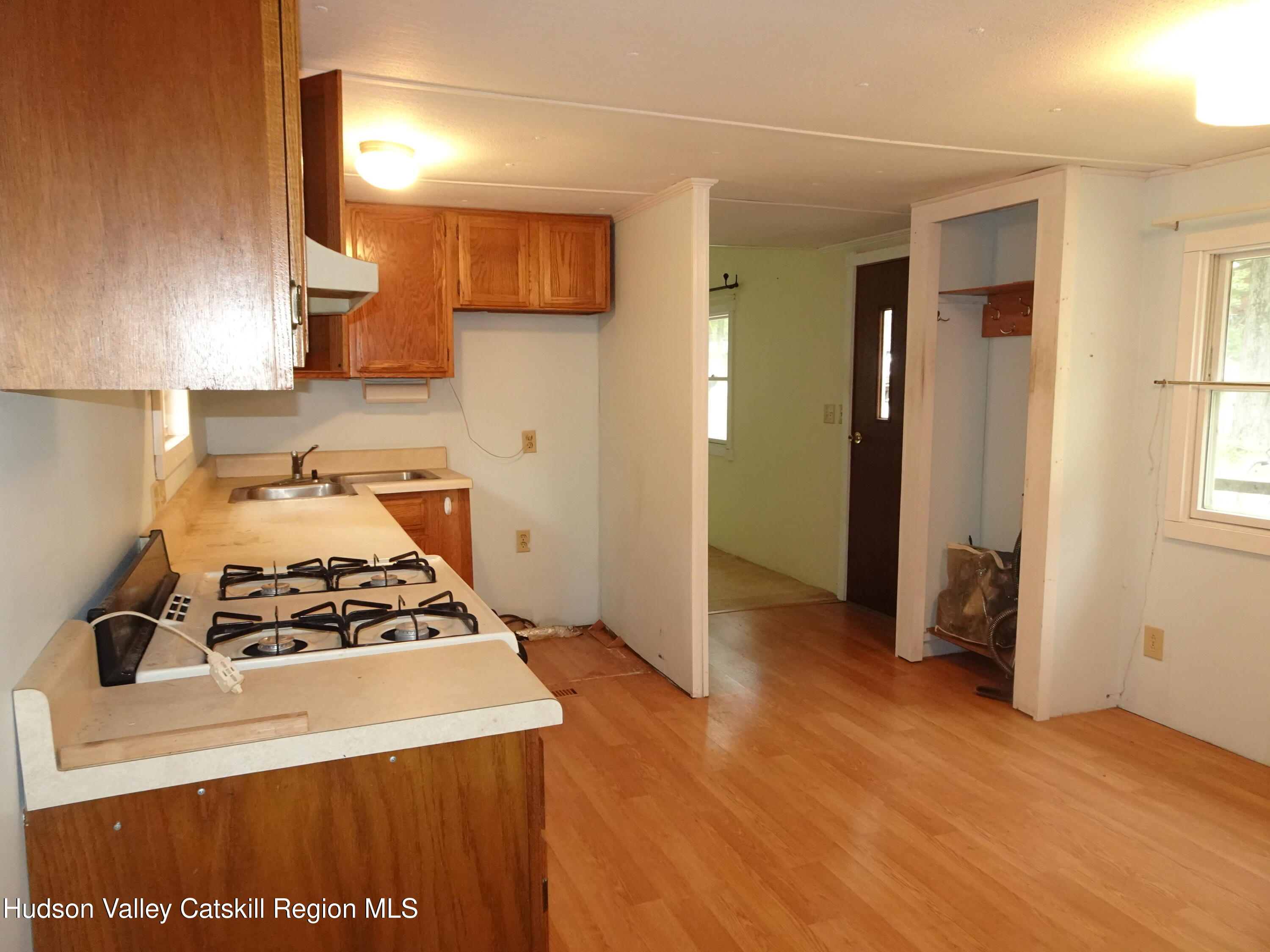 158 Middle Road Austerlitz, NY 12017 - Photo 10 of 21 a kitchen with a stove and a refrigerator