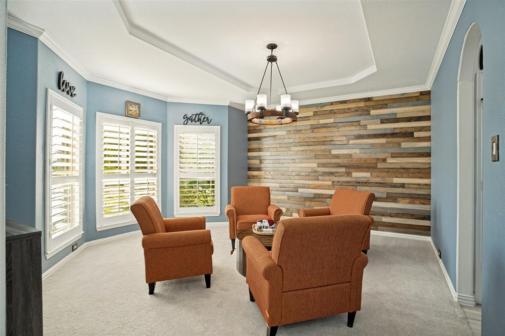 1461 Ramsbury Lane Prosper, TX 75078 - Photo 12 of 30 Accent wall with horizontal wood paneling