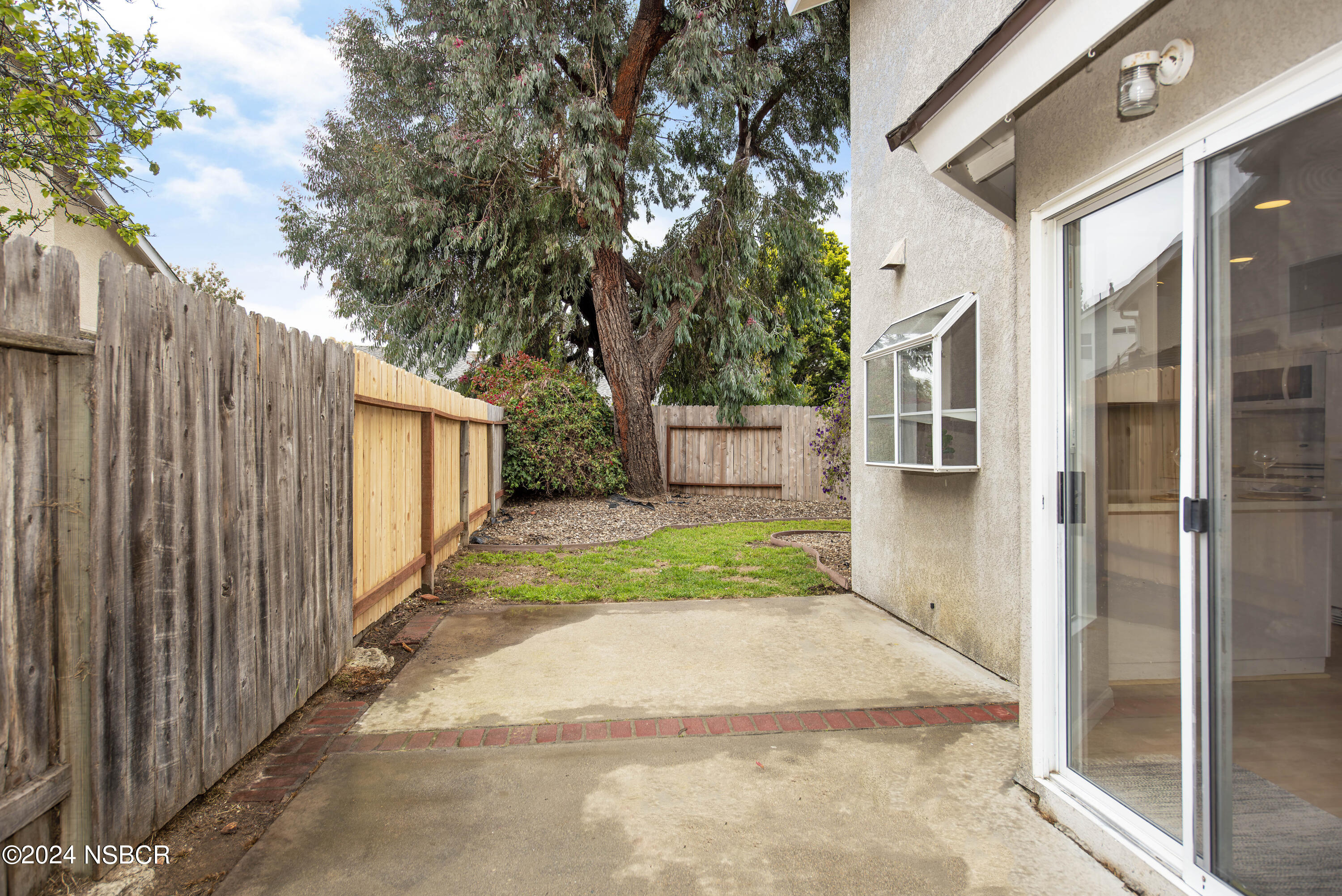 1341 Lloyd Place Lompoc, CA 93436 - Photo 19 of 20 a view of a house with a yard