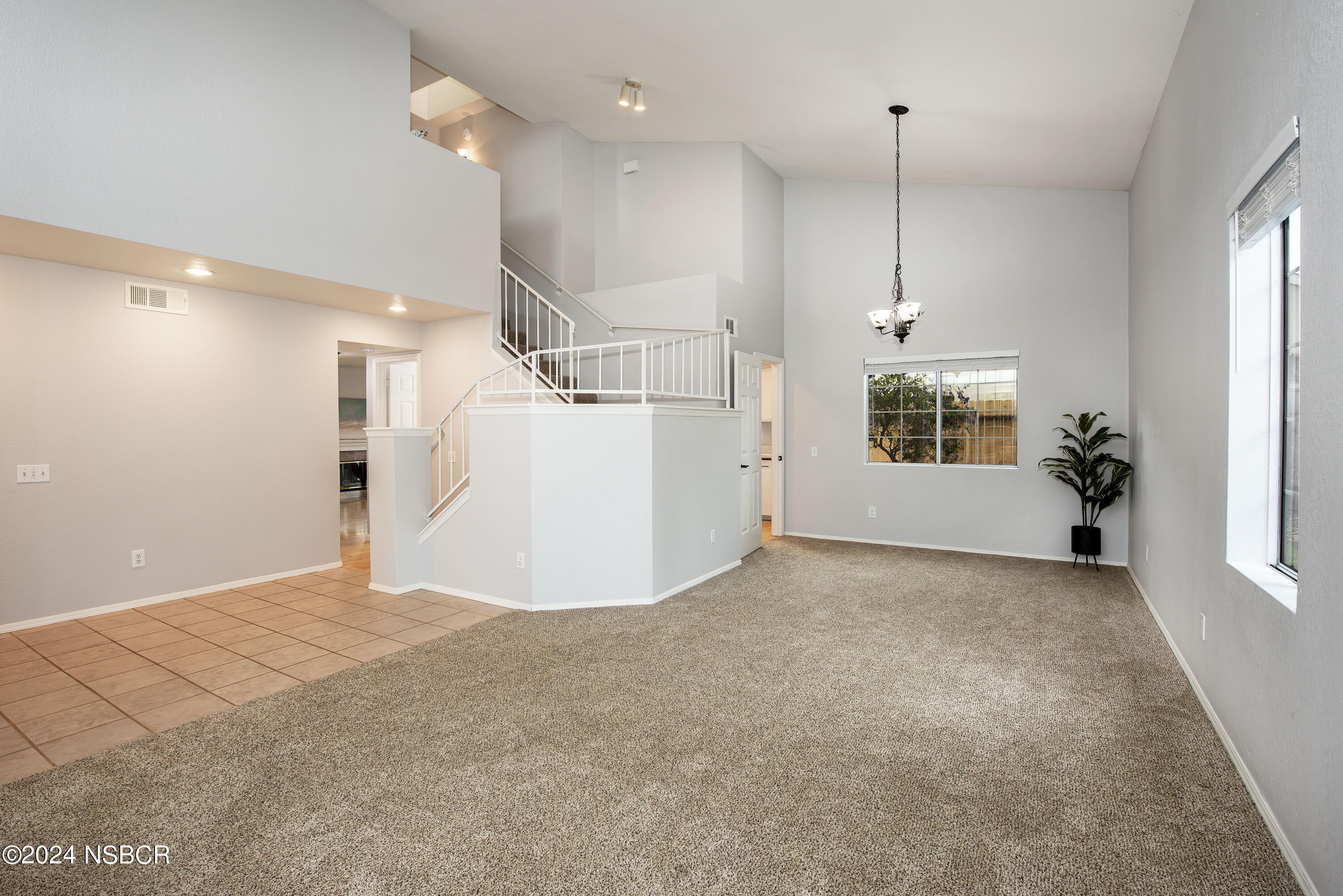 1341 Lloyd Place Lompoc, CA 93436 - Photo 2 of 20 a view of a kitchen with a sink and window