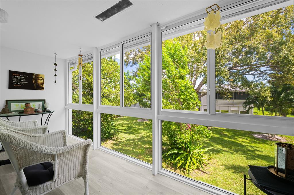 318 Oakridge R, Unit 318 Deerfield Beach, FL 33442 - Photo 18 of 26 a view of a large window with an outdoor view