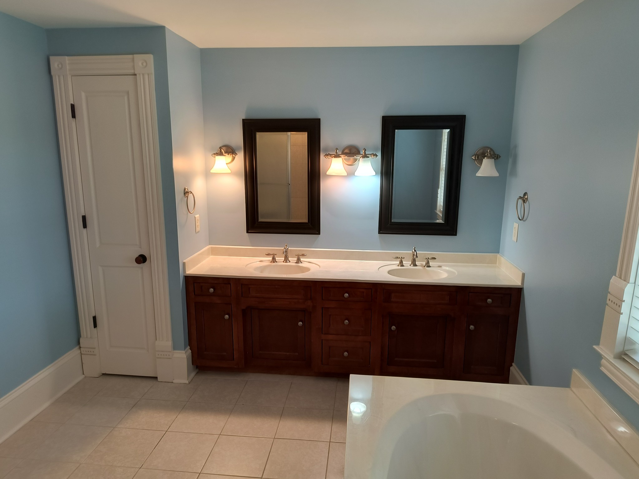 3460 Big Springs Road Lebanon, TN 37090 - Photo 72 of 74 a bathroom with a double vanity sink and mirror