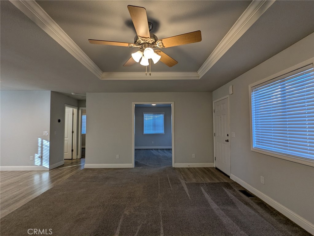 1658 Jaramillo Lane Paradise, CA 95969 - Photo 16 of 54 en empty room with ceiling fan and window