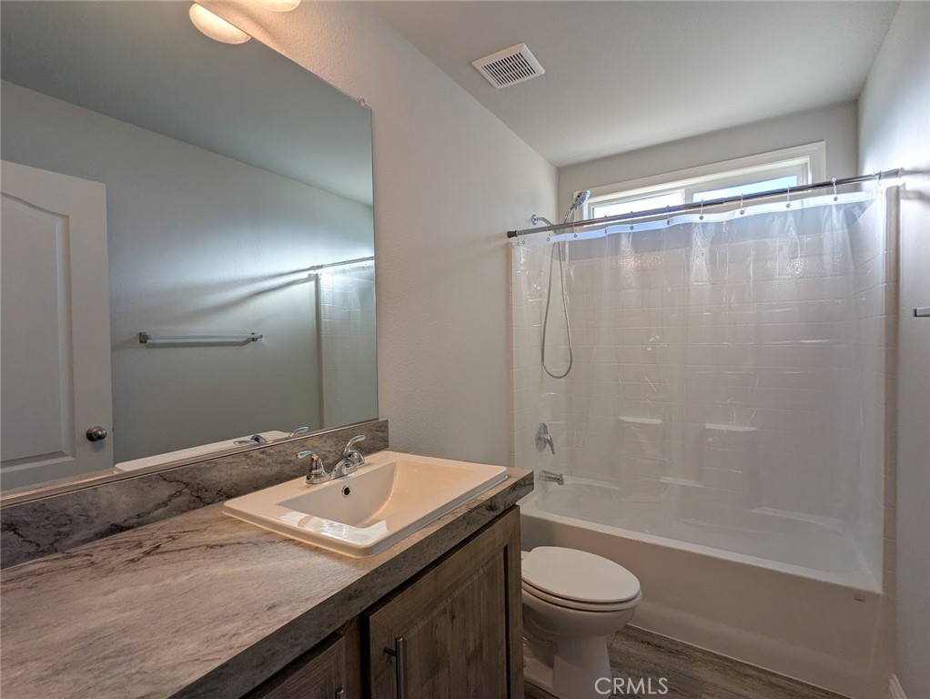 1658 Jaramillo Lane Paradise, CA 95969 - Photo 30 of 54 a bathroom with a granite countertop sink toilet and shower