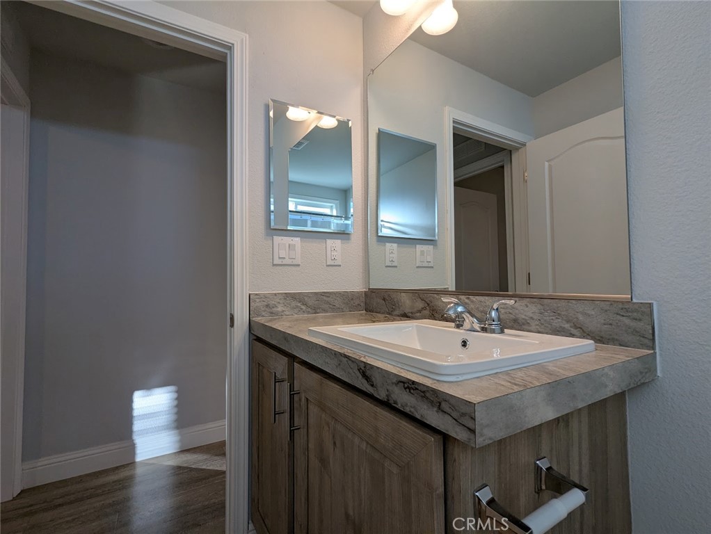 1658 Jaramillo Lane Paradise, CA 95969 - Photo 31 of 54 a bathroom with a sink and a mirror